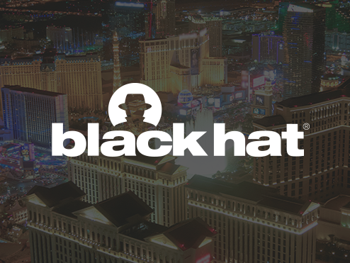 Black Hat Logo on top of Las Vegas Background